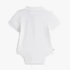Babys-Polo-Strampler und Geschenktüte Babys-Polo-Strampler und Geschenktüte