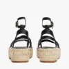 Espadrille mit gedrehten Lederriemen und Plateausohle Espadrille mit gedrehten Lederriemen und Plateausohle