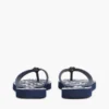 Flip-Flops mit Metallbeschlägen und TH-Schriftzug