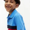Kinder-Polohemd mit Farbblock-Flaggenmuster aus Stretch Kinder-Polohemd mit Farbblock-Flaggenmuster aus Stretch