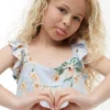 Kinderkleid mit Blumenmuster und Rüschen