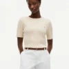 Kurzärmeliger Pullover mit Zopfmuster Kurzärmeliger Pullover mit Zopfmuster