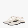 Sandalen aus Leder mit Metallic-Akzenten Sandalen aus Leder mit Metallic-Akzenten