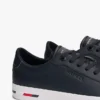 Sneaker aus vulkanisiertem Leder mit Flaggenstreifen Sneaker aus vulkanisiertem Leder mit Flaggenstreifen