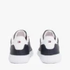 Sneaker mit gestreifter Ledersohle
