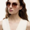 Sonnenbrille mit Metallrahmen in Schmetterlingsform Sonnenbrille mit Metallrahmen in Schmetterlingsform