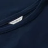 T-Shirt im maritimen Stil mit goldenen Knöpfen und U-Boot-Ausschnitt T-Shirt im maritimen Stil mit goldenen Knöpfen und U-Boot-Ausschnitt