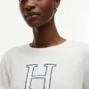 T-Shirt mit floralem H-Logo T-Shirt mit floralem H-Logo
