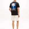 T-Shirt mit Palmen-Grafik auf der Rückseite T-Shirt mit Palmen-Grafik auf der Rückseite