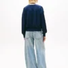 Tommy Jeans Pullover mit V-Ausschnitt und lockerer Passform Tommy Jeans Pullover mit V-Ausschnitt und lockerer Passform