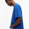 Tommy Jeans T-Shirt mit Distressed-Logo Tommy Jeans T-Shirt mit Distressed-Logo