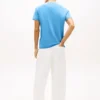 Tommy Jeans T-Shirt mit gewelltem Flaggenlogo Tommy Jeans T-Shirt mit gewelltem Flaggenlogo