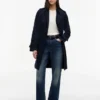 Zweireihiger Trenchcoat mit Gürtel Zweireihiger Trenchcoat mit Gürtel